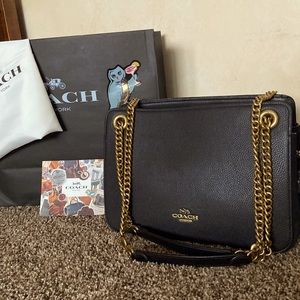 Coach black leather shoulder handbag, 12x9x5.